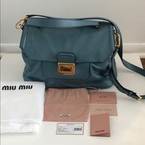 Miu Miu handbag with all authencity cards.